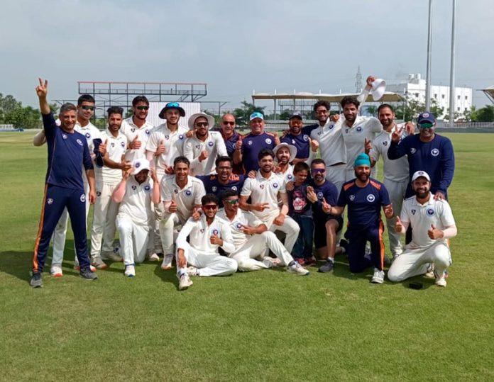 J&K Cricket team posing for group photograph after winning against Pondicherry on Sunday.