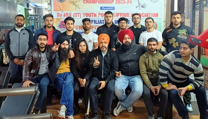 J&K-UT Powerlifting team posing with dignitaries. J&K-UT Powerlifting team posing with dignitaries.