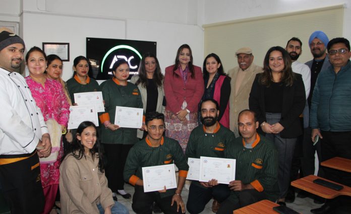 Joint Director of Tourism, Jammu Sunaina Sharma Mehta along with students of ARC Hospitality Institute posing with certificates on Friday. -Excelsior/Rakesh
