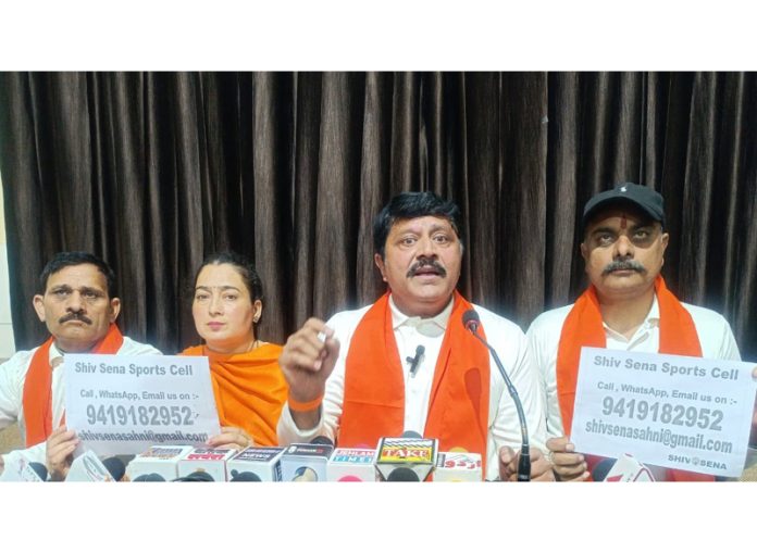 Shiv Sena leaders addressing press conference at Jammu on Friday.