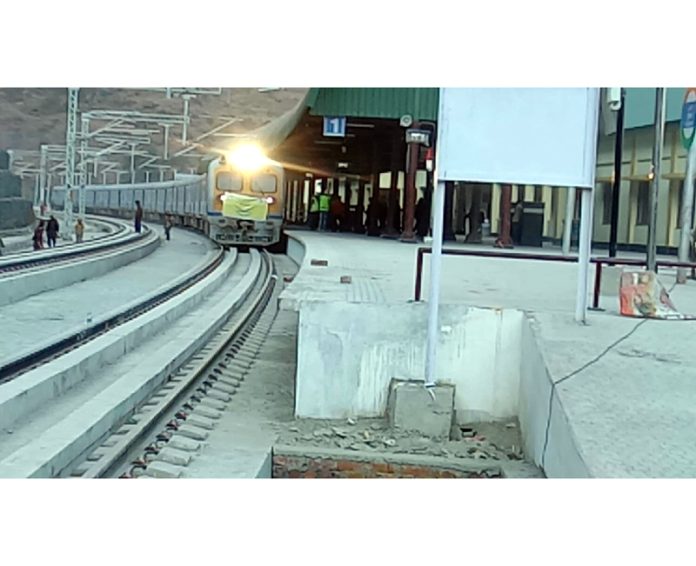 First electric engine train with eight coaches runs for trial on Sangaldan-Khari section in Ramban on Tuesday. -Excelsior/Parvez Mir First electric engine train with eight coaches runs for trial on Sangaldan-Khari section in Ramban on Tuesday. -Excelsior/Parvez Mir