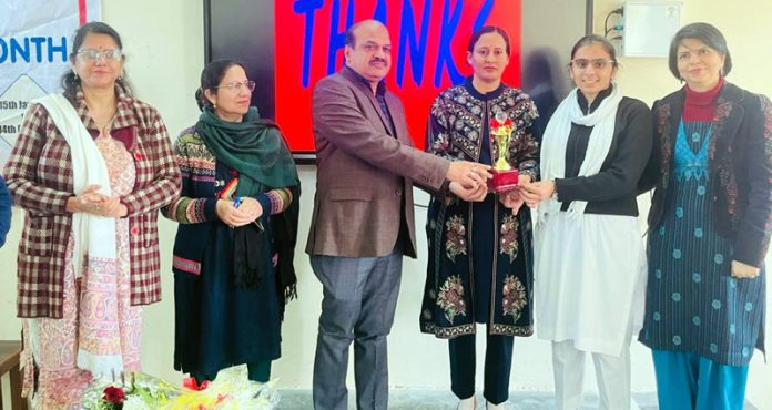 Esha Chib, ARTO Jammu presenting certificates of participation to students of GDC Khour.