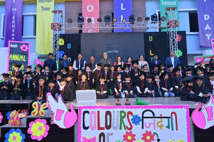 Senior BJP leader, Sham Lal Sharma posing along with students during the Annual Day event on Friday. Senior BJP leader, Sham Lal Sharma posing along with students during the Annual Day event on Friday.