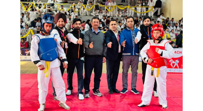 Dignitaries posing during second day of 26th J&K-UT Taekwondo Championship at Jammu on Friday. Dignitaries posing during second day of 26th J&K-UT Taekwondo Championship at Jammu on Friday.