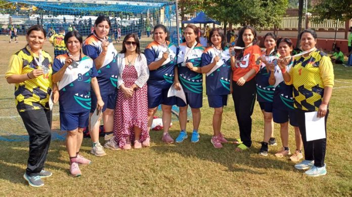 Jammu and Kashmir Women's Handball Masters team posing for photograph.