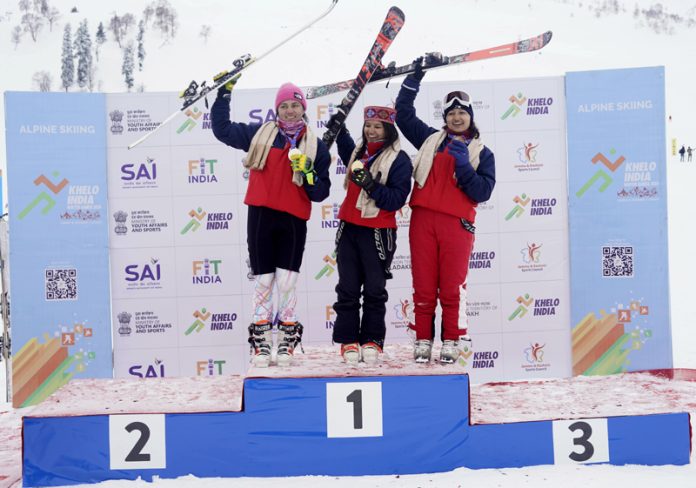Winners in skiing posing during the 3rd day of Khelo India Winter Games at Gulmarg. -Excelsior/Aabid Nabi Winners in skiing posing during the 3rd day of Khelo India Winter Games at Gulmarg. -Excelsior/Aabid Nabi
