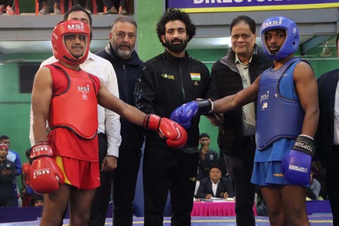 Wushu players being introduced before the match at Jammu University on Wednesday.