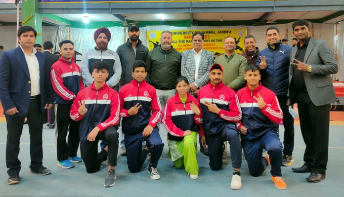 Players posing with dignitaries during the Inter-University Wushu Championship on Thursday.