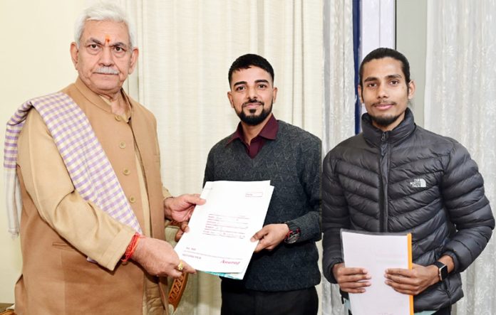LG Manoj Sinha meeting with Omar Ashraf Beig Specially-Abled cricketer and Cyclist and environmentalist Vijay Bhaskaran.