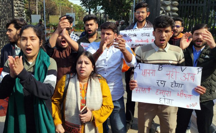 ABVP activists protesting in front of Jammu University for smooth functioning of JKPSC. -Excelsior/Rakesh
