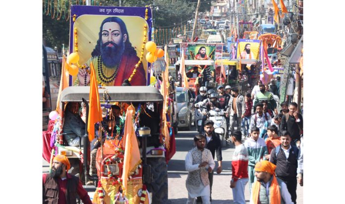 A grand Shobha Yatra of Guru Ravi Dass Ji being taken out in Jammu on Thursday. -Excelsior/ Rakesh