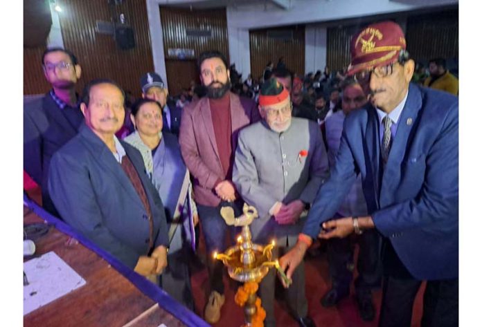 Guests lighting ceremonial lamp during the programme to observe death anniversary of Capt Tushar Mahajan.
