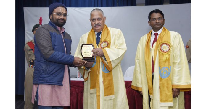 Prof Ashok Aima felicitating Dr Dayanath during IGNOU Convocation at Jammu on Tuesday.