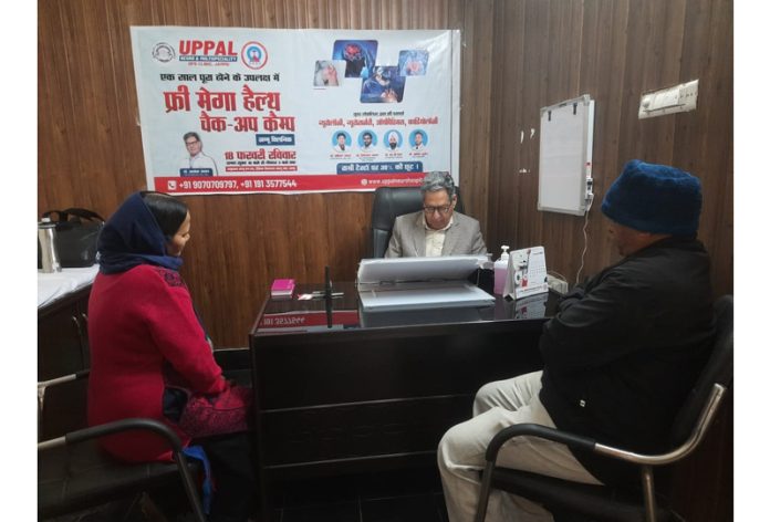 A doctor attending patients at a health check-up camp in Kaluchak on Monday.