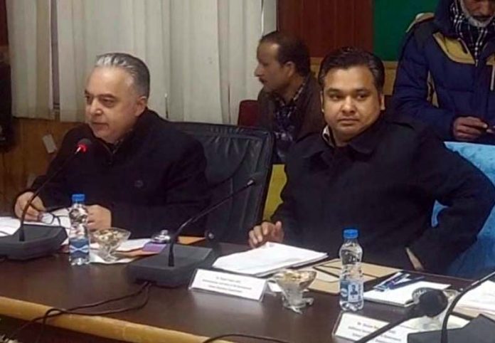 Secretary School Education chairing a meeting.