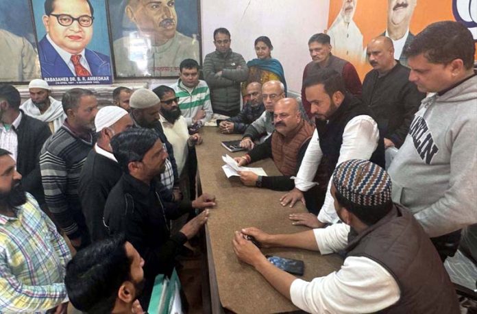 BJP vice president, Yudhvir Sethi listening public grievances at party office Kachi Chawni, Jammu on Thursday. BJP vice president, Yudhvir Sethi listening public grievances at party office Kachi Chawni, Jammu on Thursday.