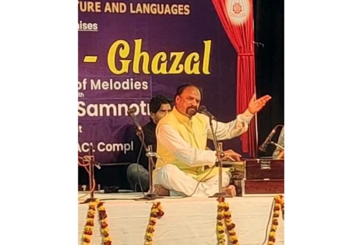A singer at Sham E Ghazal programme.