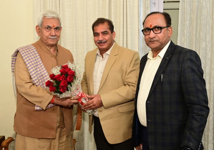 Anil Gupta and Rikki Gupta during a meeting with LG Manoj Sinha. Anil Gupta and Rikki Gupta during a meeting with LG Manoj Sinha.