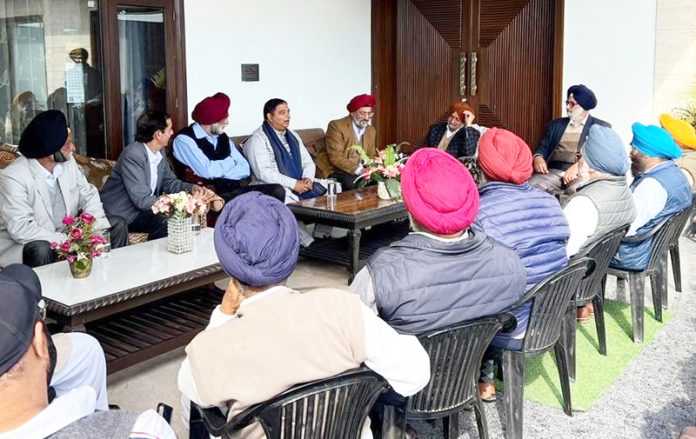 Former Minister, Sat Sharma during a meeting with minority community at Jammu on Friday.