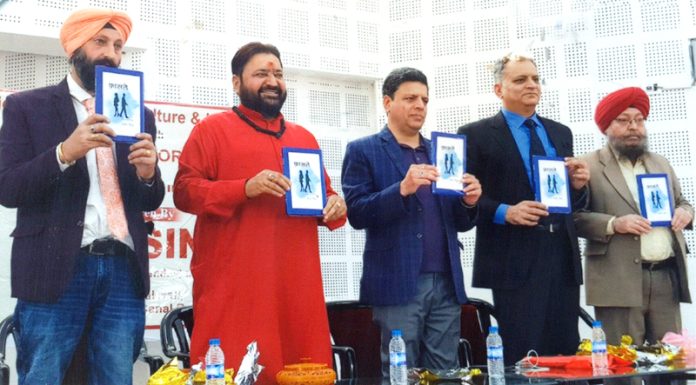 Dignitaries releasing a book of poetry in Jammu. Dignitaries releasing a book of poetry in Jammu.