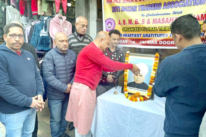 Yudhvir Sethi, vice president BJP paying floral tribute to Lala Hans Raj Mahajan Yudhvir Sethi, vice president BJP paying floral tribute to Lala Hans Raj Mahajan