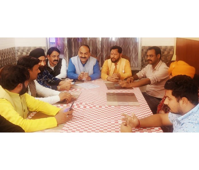 Senior BJP leader and district Prabhari, Munish Sharma at a party meeting at Kathua on Friday.