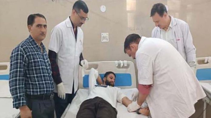 Volunteers donating blood at Police Hospital in Jammu on Sunday.