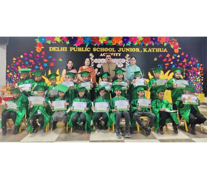 Students and teachers of DPS Junior Kathua posing together during a function.