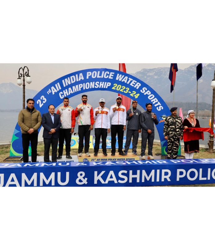 Water sports athletes posing along with medals at Srinagar on Tuesday. Water sports athletes posing along with medals at Srinagar on Tuesday.