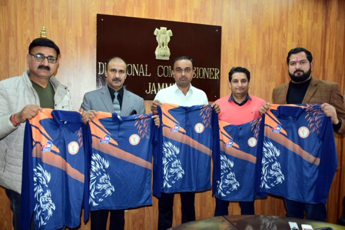 Divisional Commissioner Jammu, Ramesh Kumar along with Chief Patron of GS Sports Club, Ranjeet Kalra and others posing during uniform unveiling ceremony. Divisional Commissioner Jammu, Ramesh Kumar along with Chief Patron of GS Sports Club, Ranjeet Kalra and others posing during uniform unveiling ceremony.