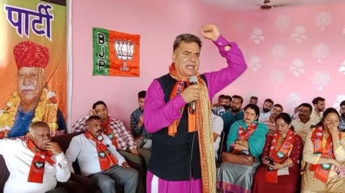 BJP president Ravinder Raina addressing a public meeting in Marh on Sunday. BJP president Ravinder Raina addressing a public meeting in Marh on Sunday.