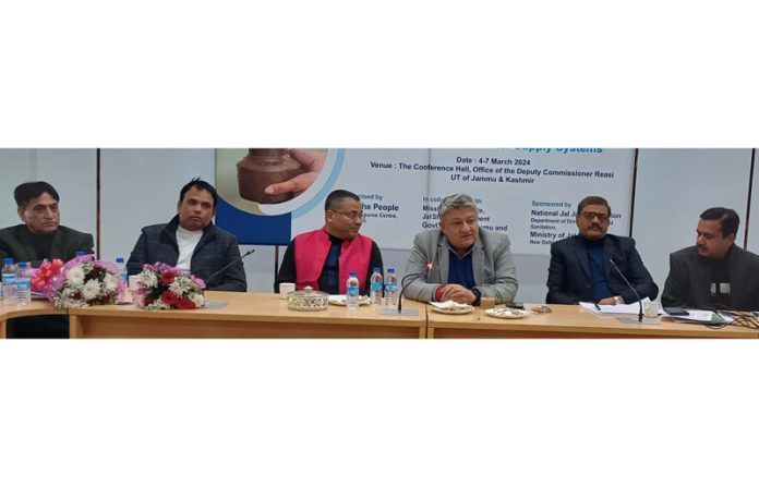 DDC Vishesh Mahajan chairing a training prog on Monday.