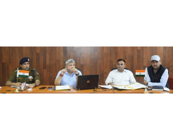DDC Reasi Vishesh Mahajan chairing a meeting on Saturday.