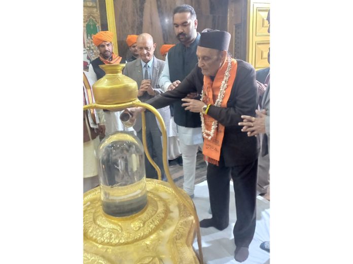 Dr Karan Singh along with Ranvijay Singh paying obeisance at the Natraj Temple in Jammu on Monday. Dr Karan Singh along with Ranvijay Singh paying obeisance at the Natraj Temple in Jammu on Monday.