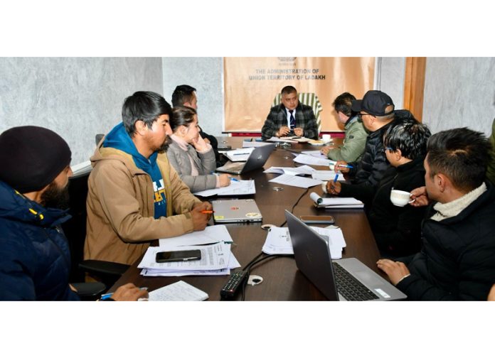 Amit Sharma chairing a meeting of stakeholders in Leh on Monday. Amit Sharma chairing a meeting of stakeholders in Leh on Monday.