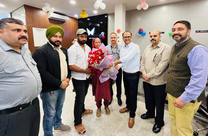 Vineet Aggarwal, Managing partner of JMV along with Anita Rani during a free service camp organised in Jammu on Monday.