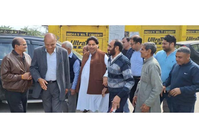 Senior Cong leader Raman Bhalla alongwith Mula Ram during meeting in Marh area on Wednesday.