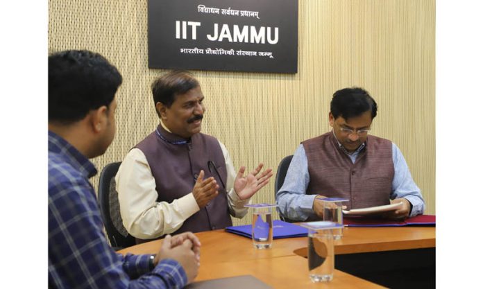 Signing of MoU by Director IIT Jammu and NIT Srinagar. Signing of MoU by Director IIT Jammu and NIT Srinagar.