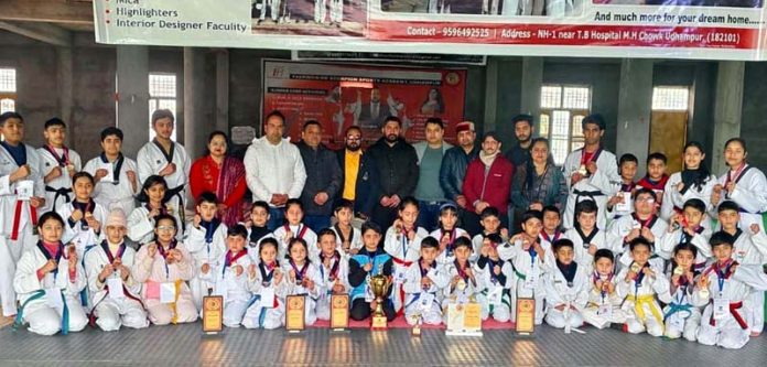 Medal winners posing with guests and sports officials.