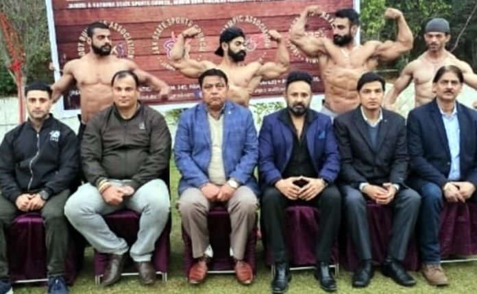 Dignitaries posing with bodybuilders at Jammu. Dignitaries posing with bodybuilders at Jammu.