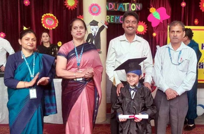 MD Dogra Higher Secondary School Gambhir Dev Singh Charak, Principal Davinder Kour and others posing with a student.