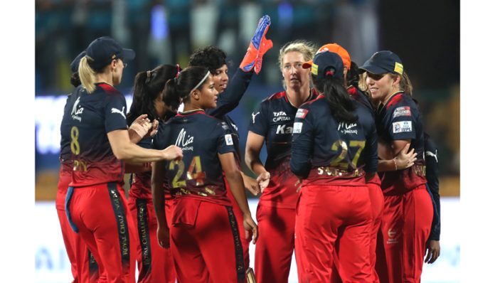 Royal Challengers Bangalore team celebrating victory against UP Warriorz.