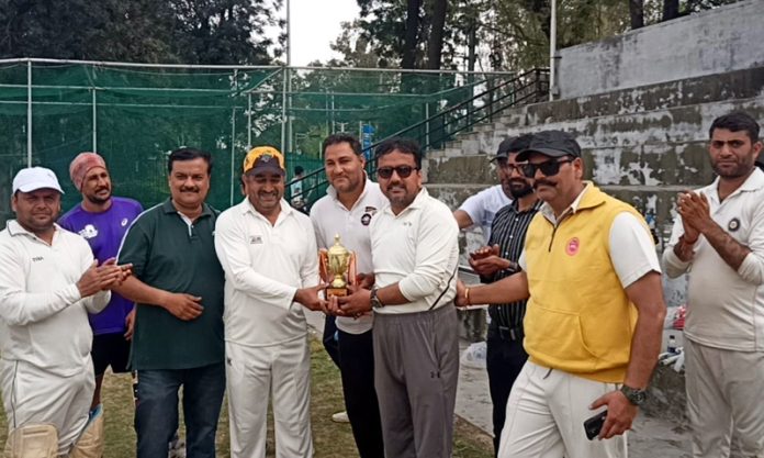 Winning team receiving trophy from chief guest during a match at Jammu University on Friday. Winning team receiving trophy from chief guest during a match at Jammu University on Friday.