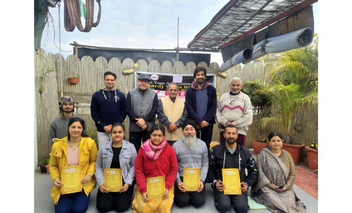 Dignitaries posing along with Yoga teachers at Jammu. Dignitaries posing along with Yoga teachers at Jammu.