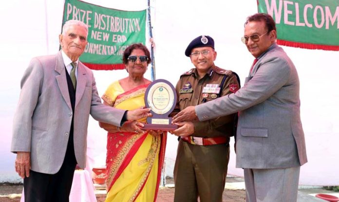 Prabha Jain, Chairperson New Era Environmental High School presenting memento to Anand Jain, ADGP Jammu on Saturday.