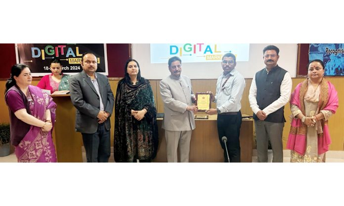 Thakur Gulchain Singh Charak, Chairman Dogra Educational Trust presenting memento to Technical Trainer, ICT Academy. Thakur Gulchain Singh Charak, Chairman Dogra Educational Trust presenting memento to Technical Trainer, ICT Academy.