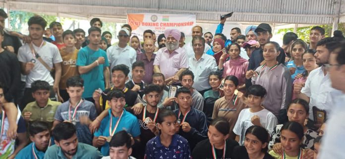 Boxers posing with medals along with dignitaries during concluding ceremony at Jammu on Sunday. Boxers posing with medals along with dignitaries during concluding ceremony at Jammu on Sunday.