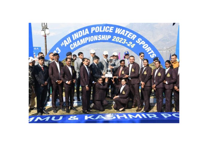 Advisor Rajeev Rai Bhatnagar along with DGP RR Swain and others posing with winning team at Srinagar on Friday.