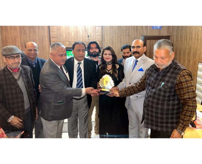 Dignitaries during a function organized by Bhartiya Kala Sangam at Jammu on Thursday.