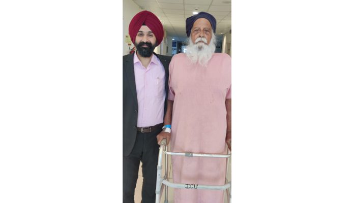 Dr Ranjit Singh posing with a patient after performing knee replacement procedure. Dr Ranjit Singh posing with a patient after performing knee replacement procedure.